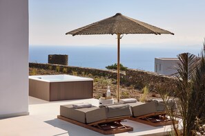 Superior Suite with Hot-tub & terrace with Side Sea View (70m from main building) | Terrace/patio