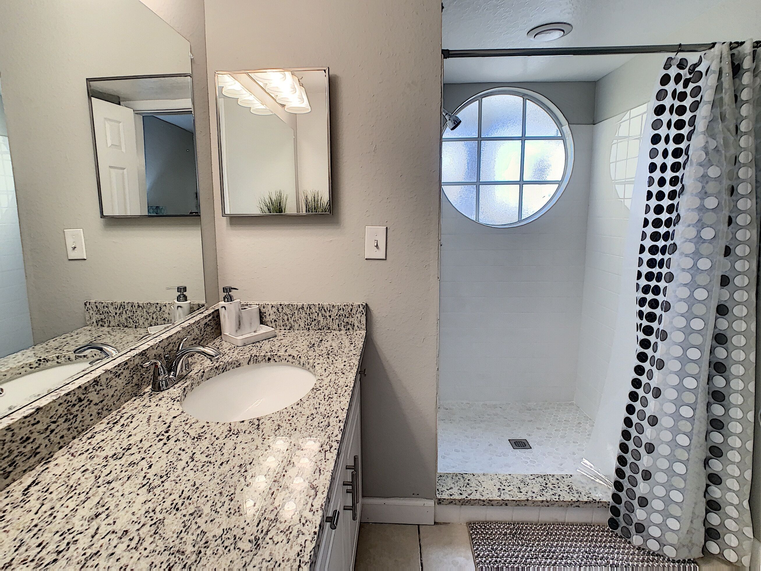 Bathtub, hair dryer, towels, soap