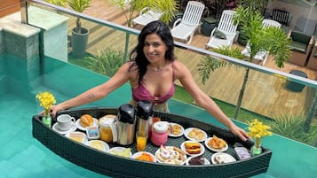 Outdoor pool, open 9:00 AM to 9:00 PM, pool umbrellas, sun loungers