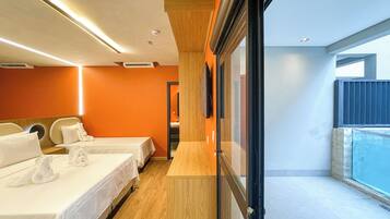 Habitación cuádruple exclusiva, alberca privada | Camas con efecto memoria, minibar, cortinas blackout y insonorización