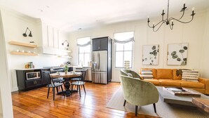 A modern kitchen with a dining area and a living room. - EAST 46 G - 1 Block to King! (Charleston)