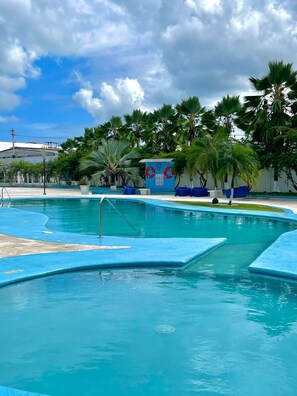 Outdoor pool, open 9:30 AM to 7:00 PM, sun loungers