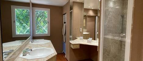 Bathtub, hair dryer, towels, soap