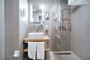 Shower, free toiletries, hair dryer, slippers