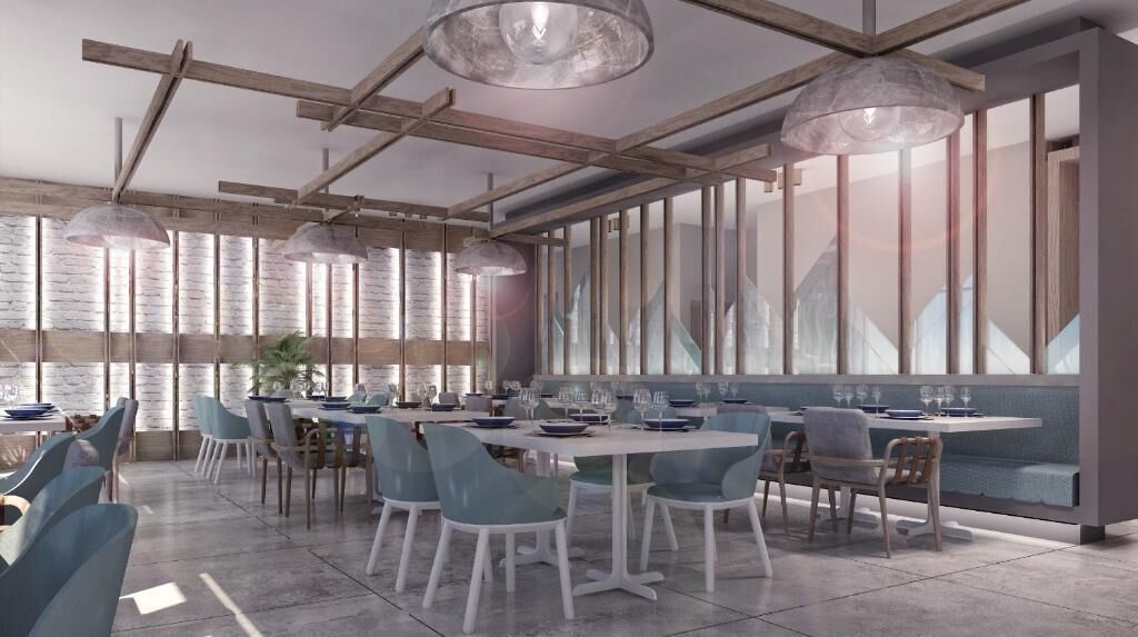 A modern dining area with long tables, blue chairs, and large windows.