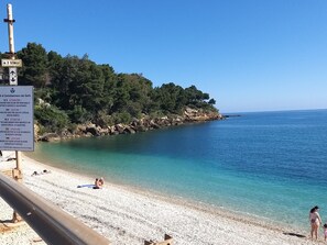 On the beach, sun loungers