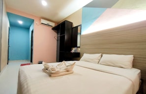 Habitación doble Deluxe | Escritorio, wifi gratis y ropa de cama
