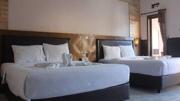 Family Room | Desk, bed sheets