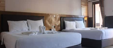 Family Room | Desk, bed sheets
