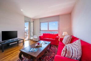 21-inch flat-screen TV with satellite channels, TV