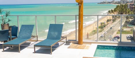 Outdoor pool, open 9:00 AM to 9:00 PM, pool loungers