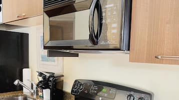 Microwave, coffee/tea maker, cookware/dishes/utensils