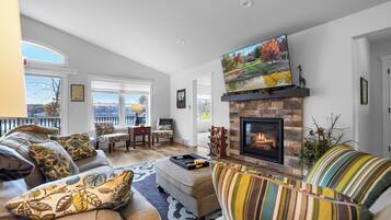 Smart TV, fireplace, table football, books