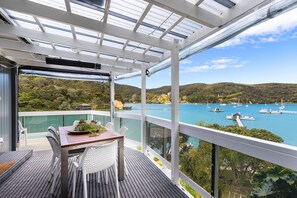 Enjoy unobstructed views of the marina and surrounding hills from this outdoor dining area.