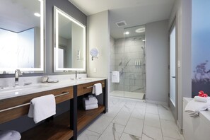 Designer toiletries, hair dryer, bathrobes, slippers