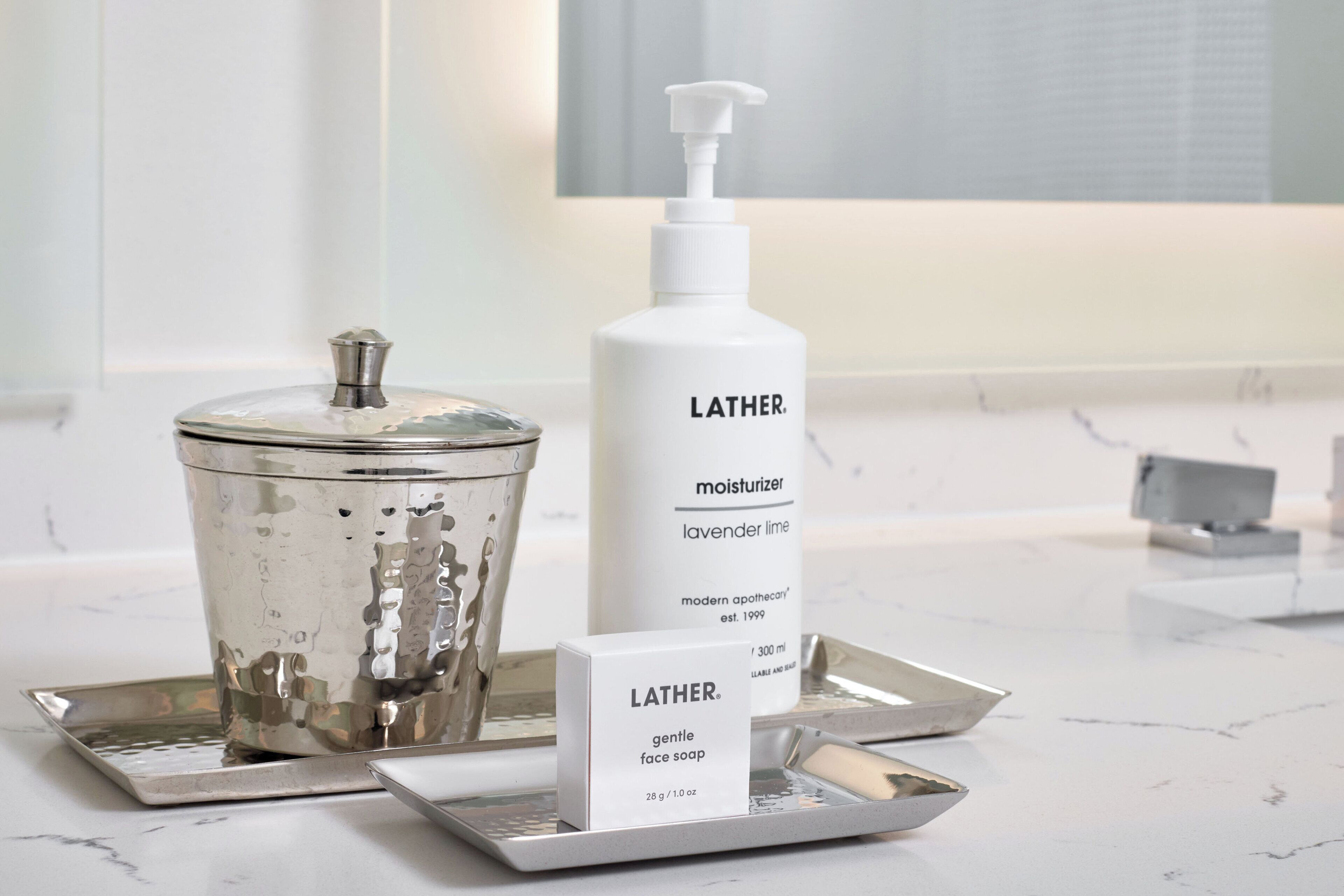 designer toiletries, hair dryer, bathrobes, slippers