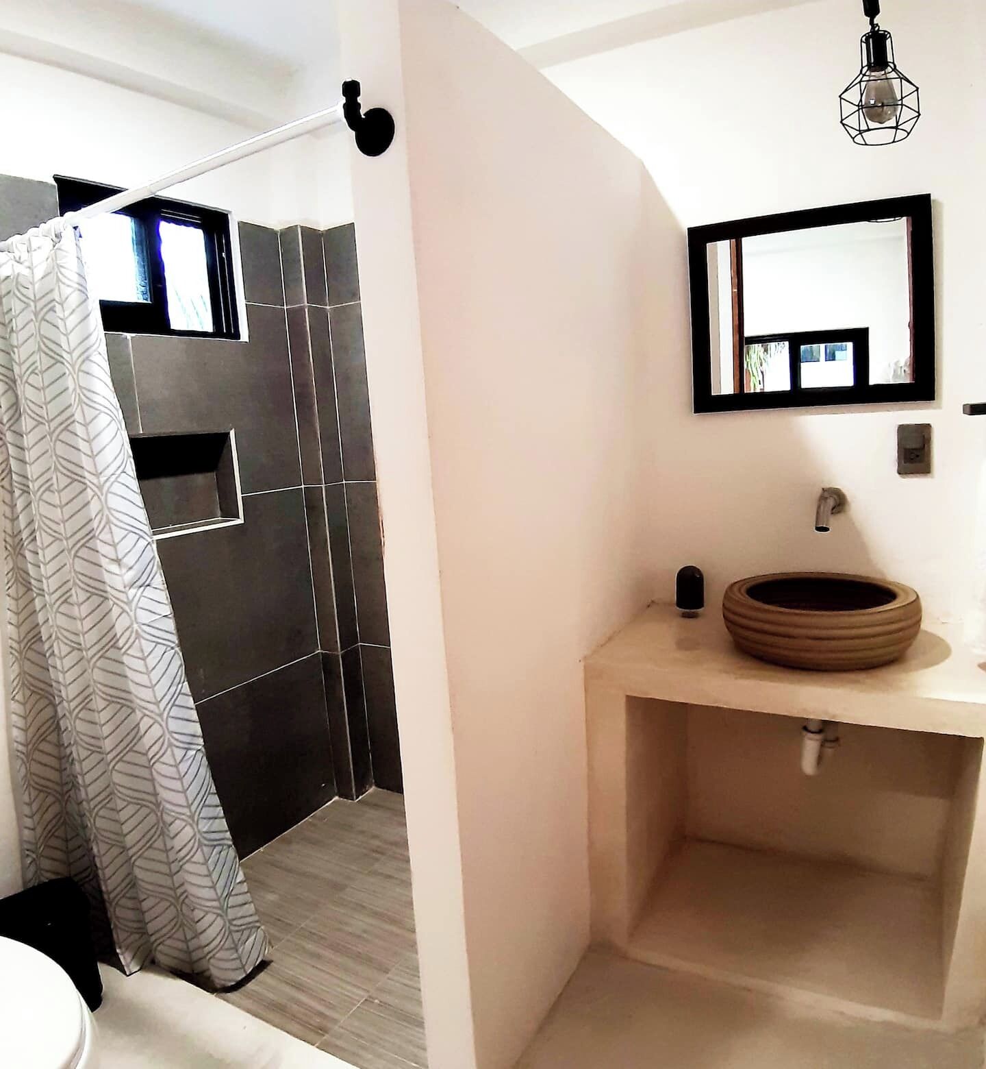 Bathtub, hair dryer, towels, soap