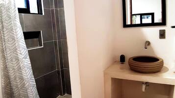 Bathtub, hair dryer, towels, soap