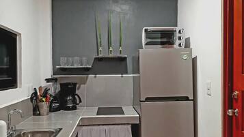 Fridge, microwave, stovetop, coffee/tea maker