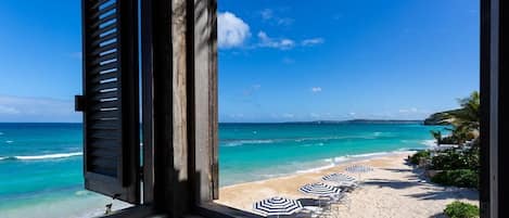 On the beach, sun-loungers, beach towels