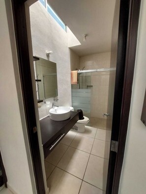 Shower, hair dryer, towels, soap