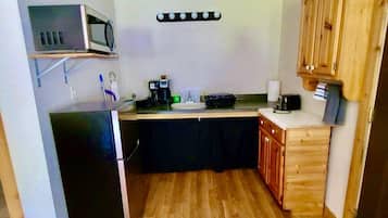 Fridge, microwave, coffee/tea maker, toaster