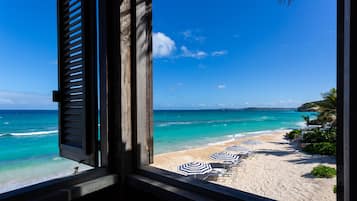 On the beach, sun-loungers, beach towels