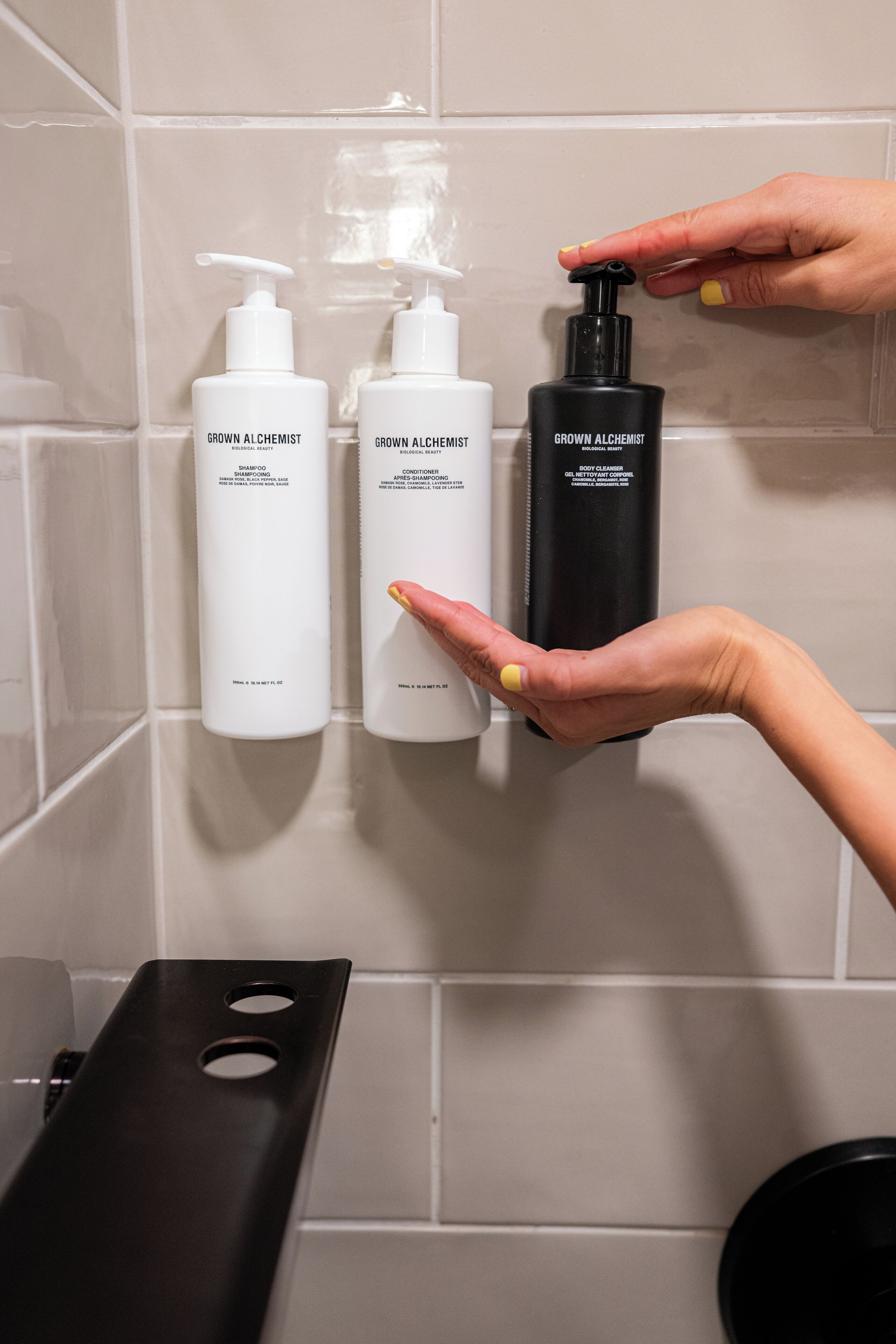 designer toiletries, hair dryer, bathrobes, slippers