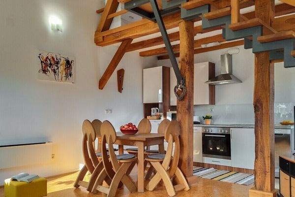 Duplex Gallery dining area with traditional furnishings