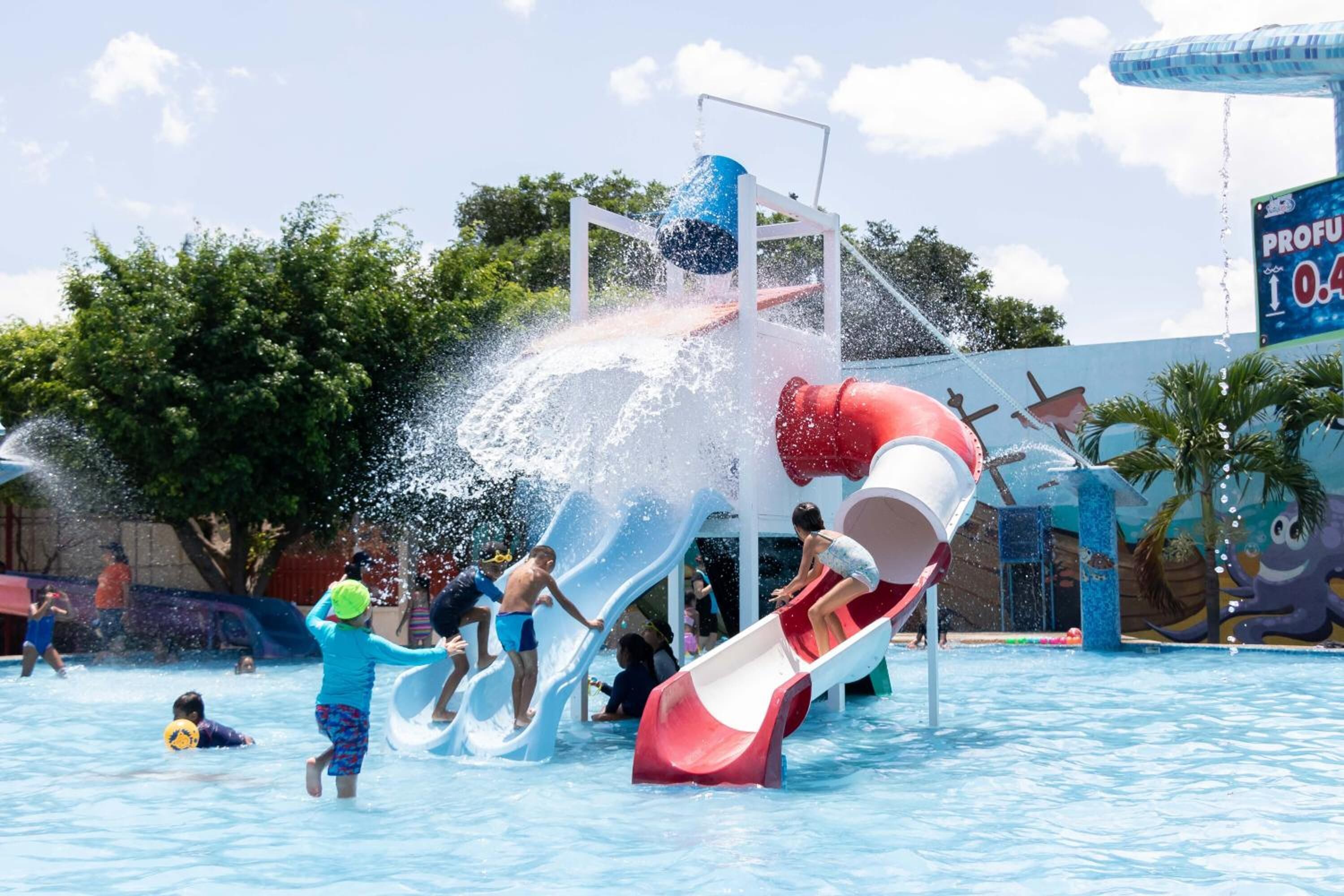 A water park with multiple slides and water features.