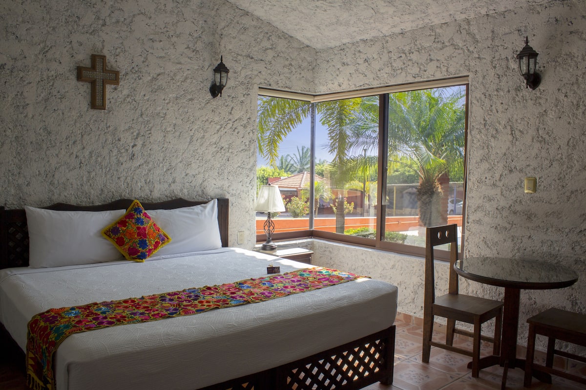 Bangalô básico, 2 quartos, cozinha americana | 2 quartos, ferros/tábuas de passar roupa, Wi-Fi de cortesia