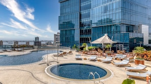 Outdoor pool, open 6:00 AM to 10:00 PM, pool umbrellas, pool loungers