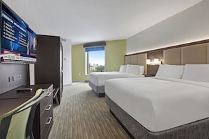 Hypo-allergenic bedding, pillowtop beds, in-room safe, desk