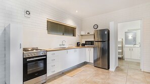 Fridge, microwave, toaster, cookware/dishes/utensils