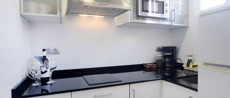 Fridge, microwave, stovetop, coffee/tea maker