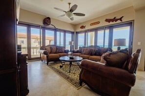 Smart TV, DVD player - Ocean’s Edge 4A – Fourth-Floor Beachfront Condo with Sweeping Caribbean Views (Ambergris Caye)