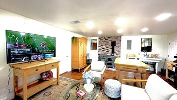 Smart TV, fireplace, books, offices