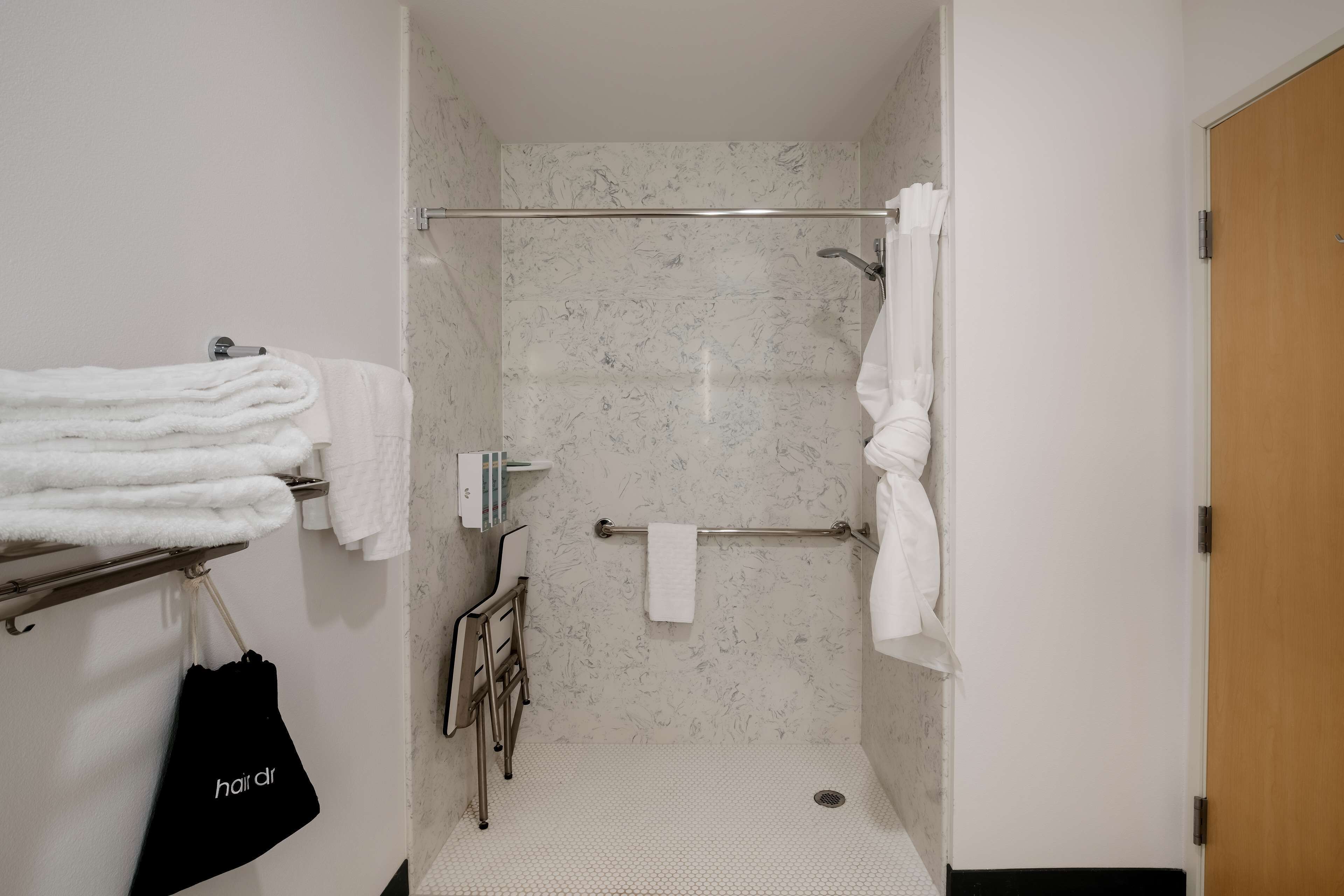 shower, free toiletries, hair dryer, towels