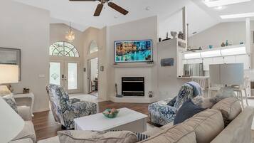 Smart TV, fireplace, video-game console, foosball