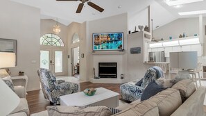 Smart TV, fireplace, video game console, table football