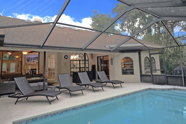 Private pool backing up to the woods