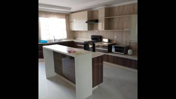 Apartment, 4 Bedrooms, Smoking, Terrace | Private kitchen | Fridge, microwave, electric kettle, cookware/dishes/utensils