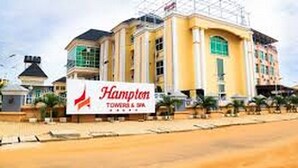 A hotel with a sign reading 'Hampton Towers & Spa'. - Room-hampton Towers & Spa - Guest Room (Asaba)