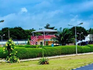 Room, 1 Bedroom, Accessible, Smoking | Property grounds - Room-whispering Palms Resort (Lagos)