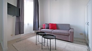 Departamento, 2 habitaciones | Área de sala de estar