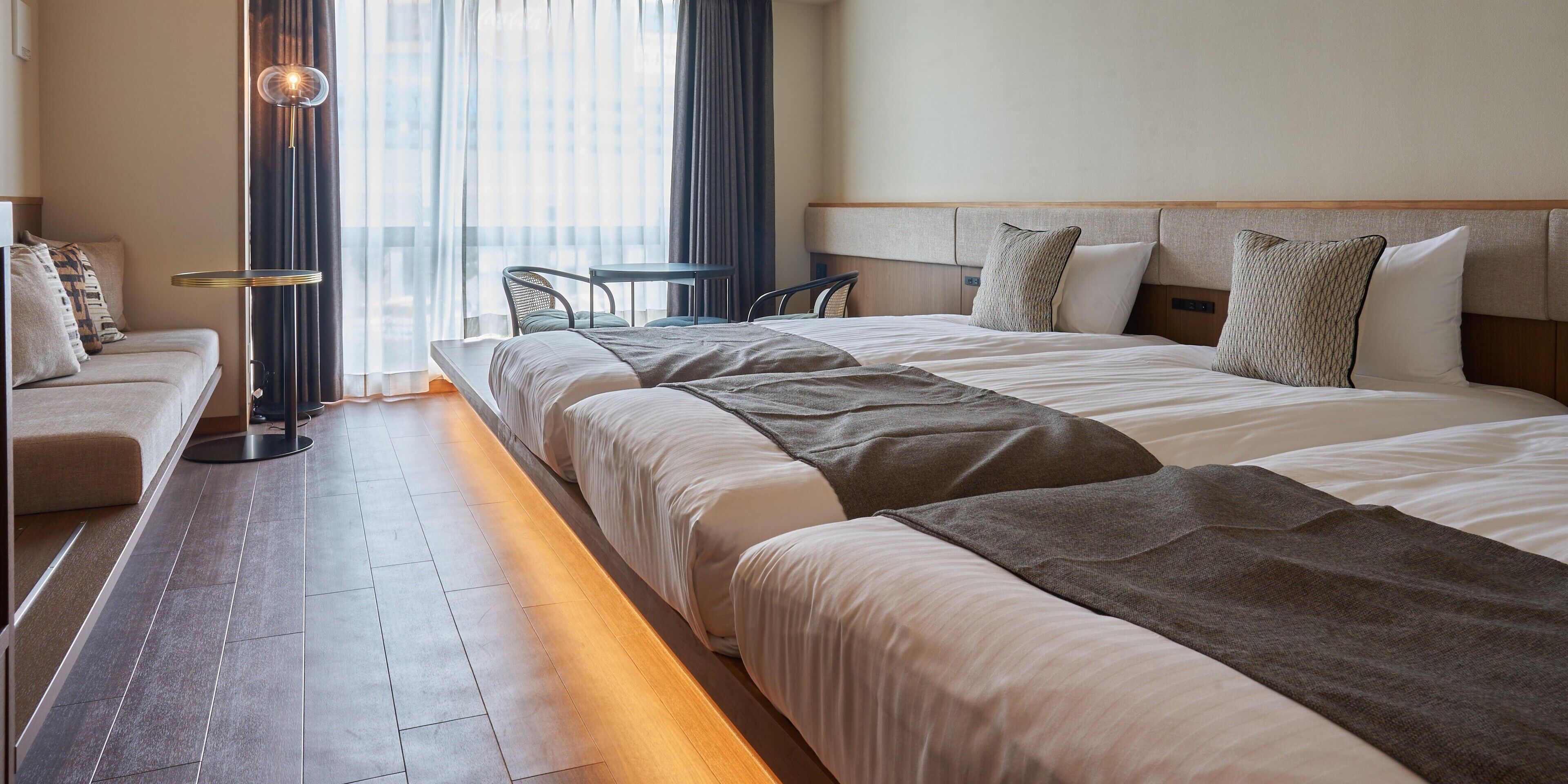 Standaard driepersoonskamer | Een kluis op de kamer, gratis wifi, beddengoed