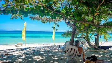 On the beach, white sand