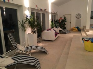 House | Living area | 30-inch TV with digital channels, fireplace - Luxury Accom With Pool Henbury Macclesfield (Macclesfield)