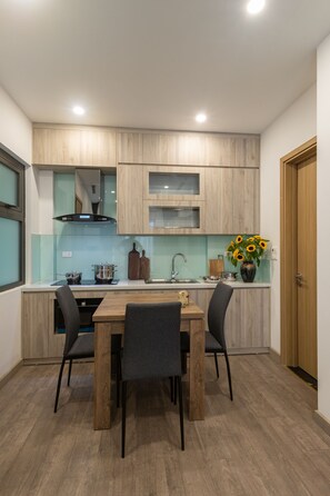 Executive Apartment | Private kitchen | Fridge, microwave, electric kettle, rice cooker