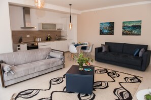 Apartment | Living room | 30-inch TV with digital channels, fireplace - 1-bed Large Apartment in Tivat Swiming Pool (Tivat)